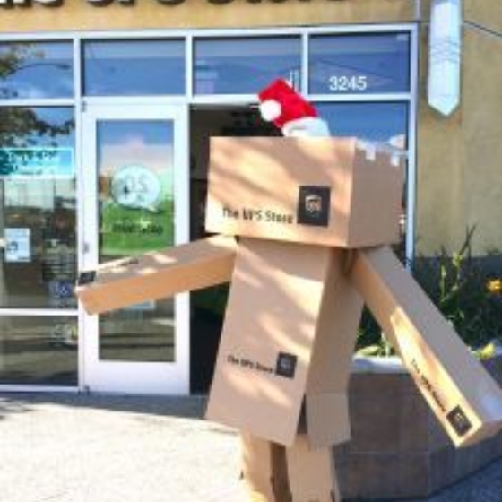 What does the box say? San Diego-based The UPS Store owners make merry of long lines.