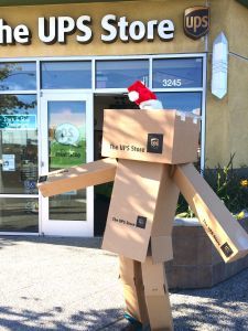 What does the box say? San Diego-based The UPS Store owners make merry of long lines.